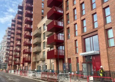 Image of building where brickwork and scaffolding is taking place.